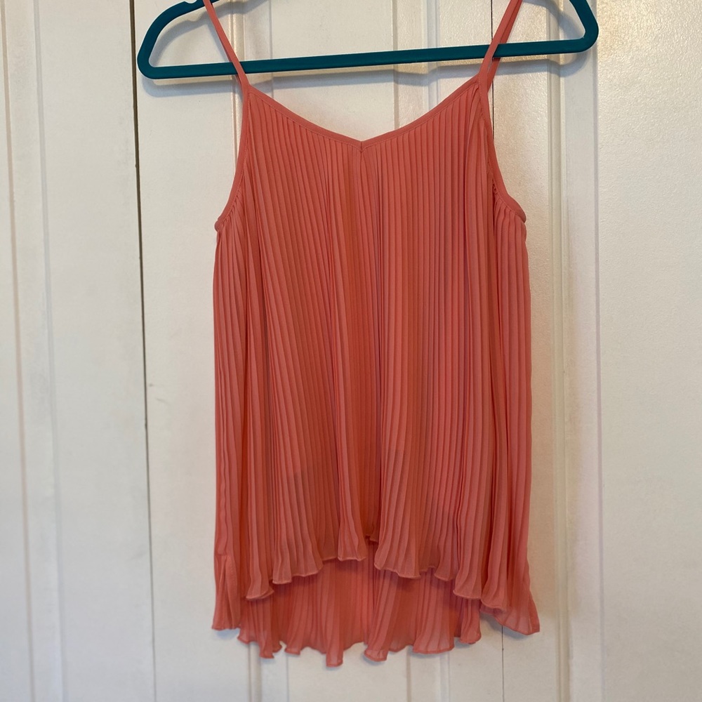Pink sleeveless ruffle high-low blouse